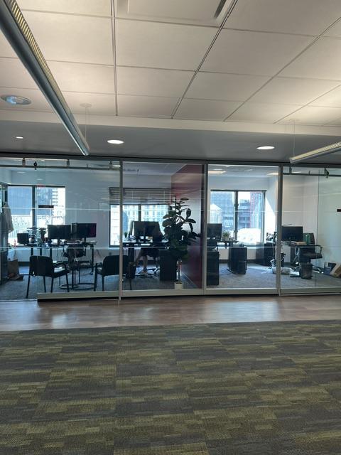 2 large glass wall offices adjacent