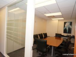 	The large conference room has a glass wall