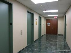 Elevator Lobby With Proximate Entrance To Space