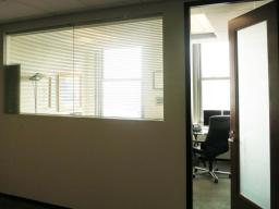 Glass panel in wall and door