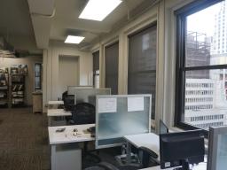Row of cubes facing offices