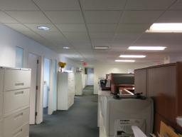 Offices with rows of workstations immediately outside