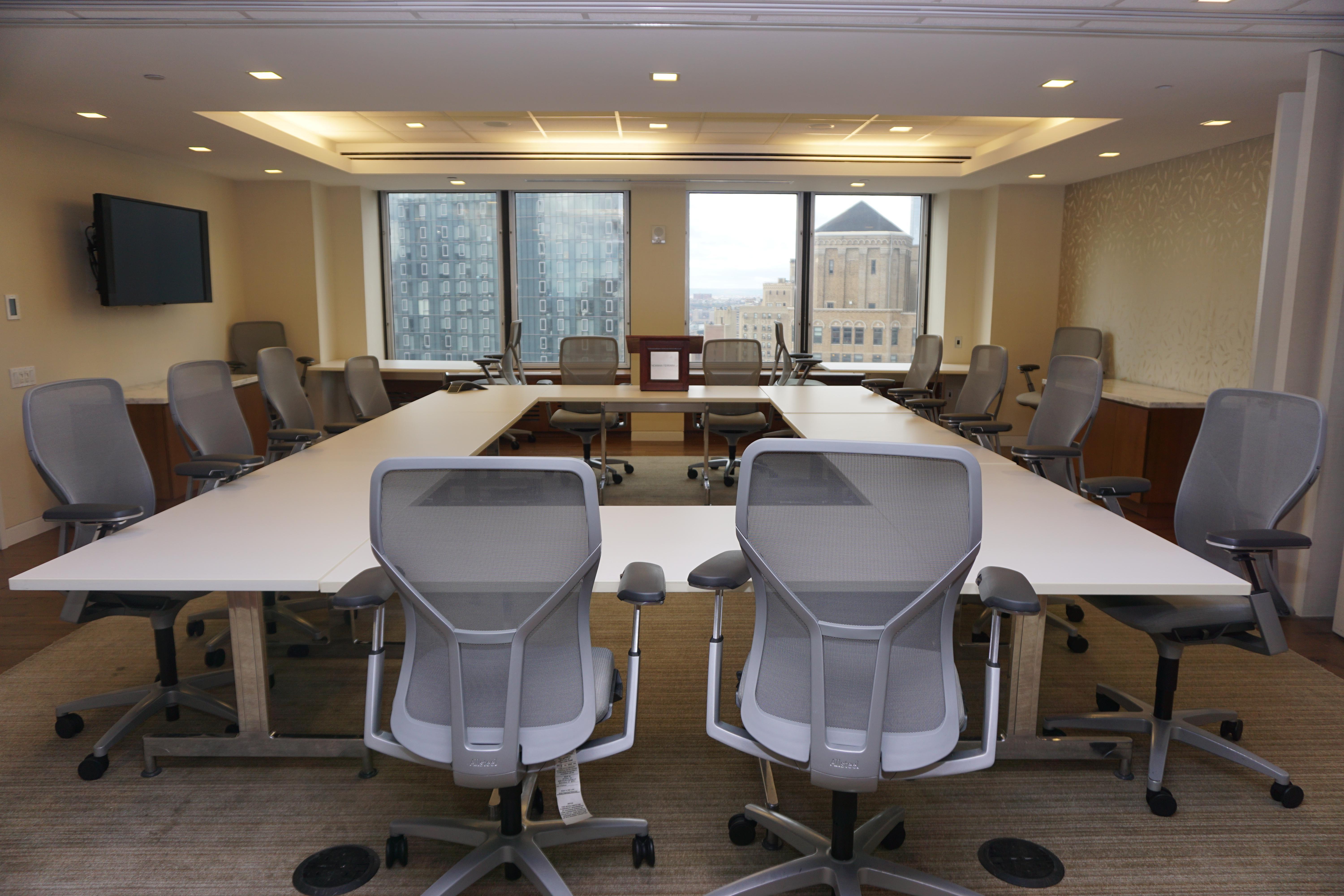 Board room easily seats 16 people
