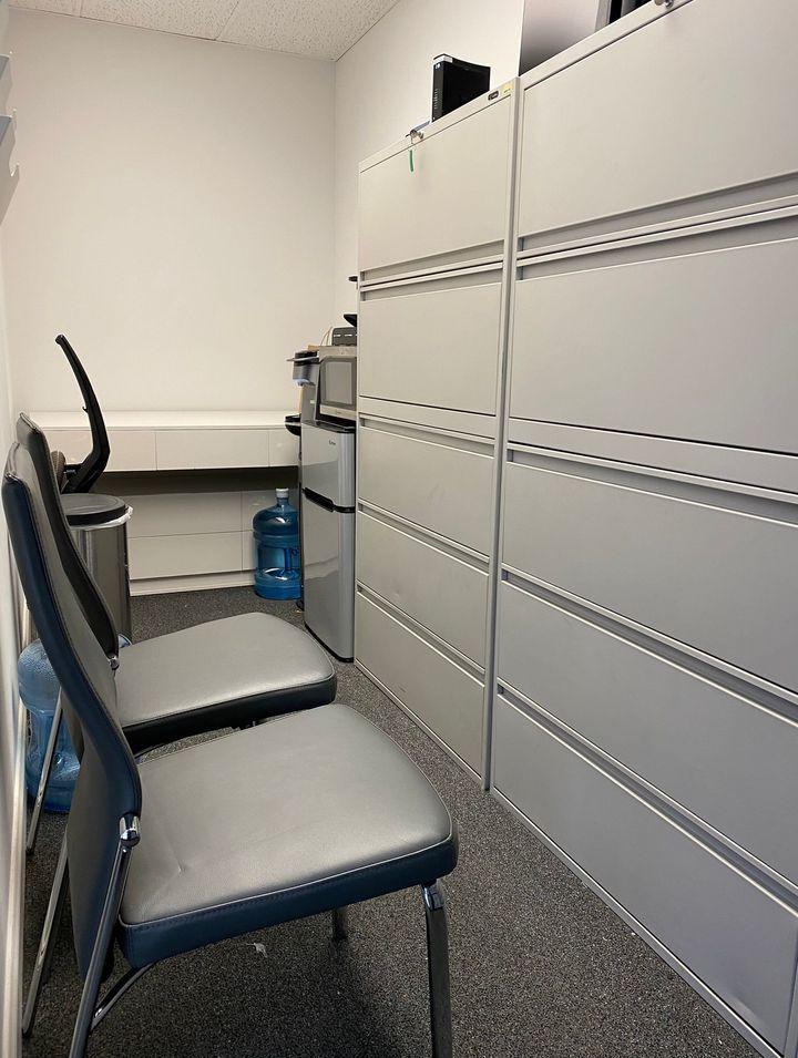 Additional space with file cabinets + microwave + refrigerator + coffee station