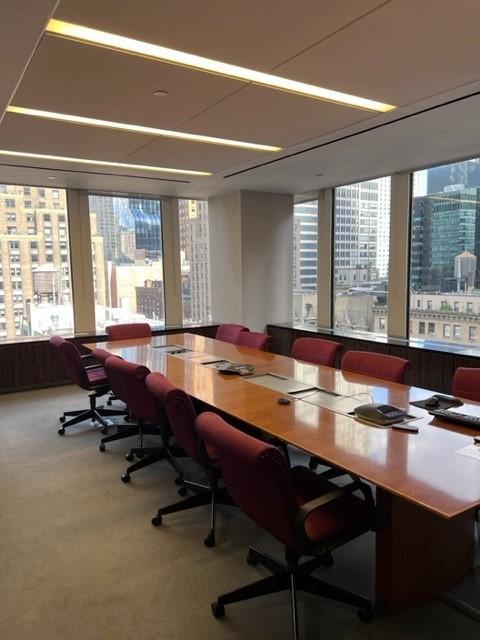 WIndowed Corner Conference Room (w/ full AV)
