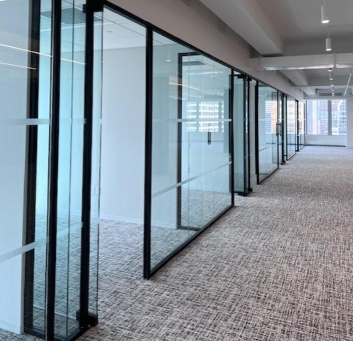 Row of glass wall offices example finishes