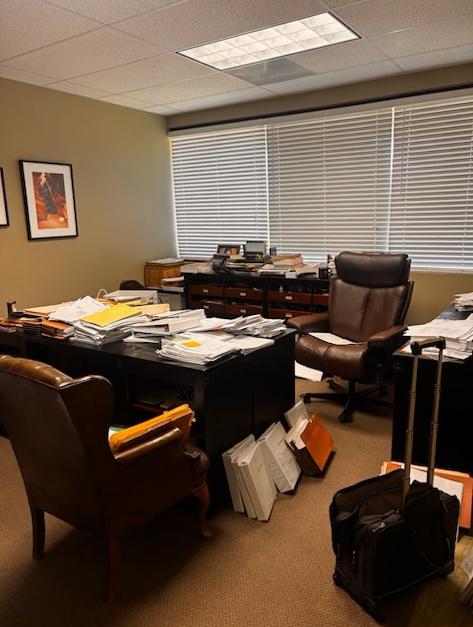 Office with desk and chairs