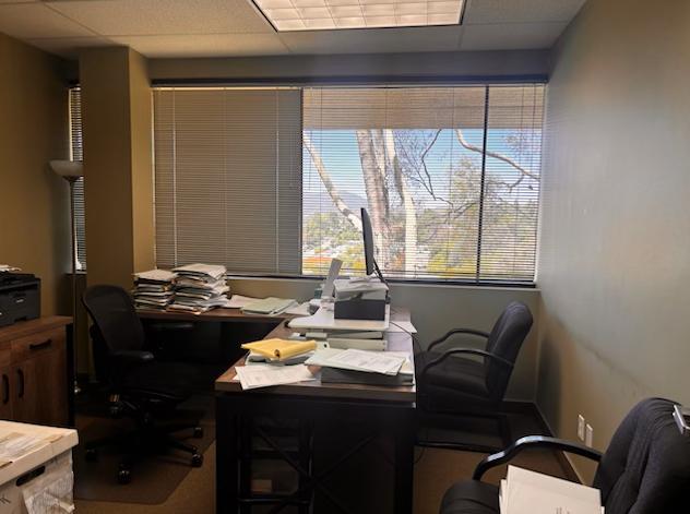 Office with desks, chairs, windows