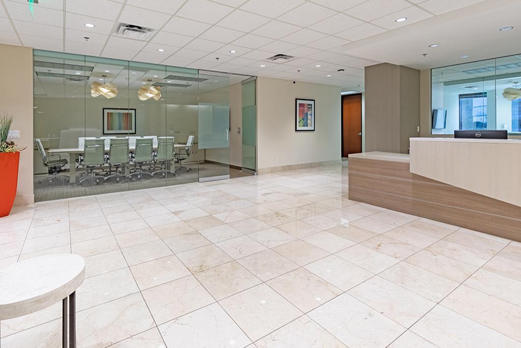 Open area with reception desk and conference room