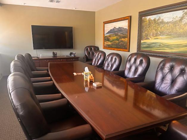 Windowed conference room table and chairs